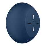 The Satisfyer Air Power 4 in navy is a circular wireless speaker with a smooth surface. It features four silver control buttons in a cross pattern, including plus and minus for volume, with a small Wi-Fi icon and power button between the controls.