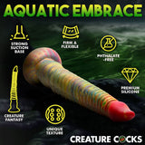 The Creature Cocks Tenta-Dick is a multi-colored, textured silicone toy featuring a strong suction-cup base. Highlighting its Firm & Flexible and Unique Texture, its made from phthalate-free silicone, offering a whimsical delight as part of the Creature Cocks collection.