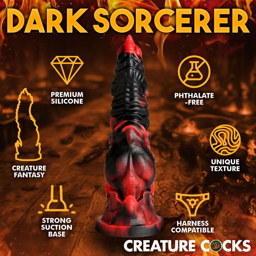 A fantasy-themed novelty item, the Creature Cocks Mephisto - Red/Black 18.5 cm Fantasy Dildo stands centrally against a fiery background with icons labeled Premium Silicone, Phthalate-Free, Creature Fantasy, and Strong Suction Base. Perfect for any Mephisto-inspired adventure.