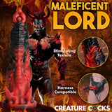 The Creature Cocks Mephisto - Red/Black Fantasy Dildo features a premium silicone design with a textured surface, depicting a muscular, horned demon amidst flames. It is labeled Maleficent Lord, offers Stimulating Texture, and is Harness Compatible for strap-on use.