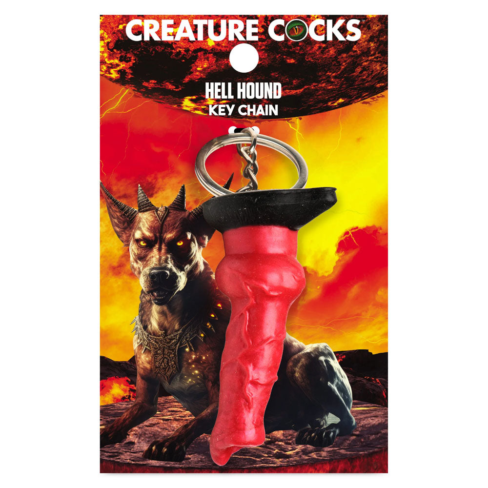 The Creature Cocks keychain features a hell hound design with a red flame-shaped charm and a backdrop of a horned creature. Its perfect for fantasy roleplay enthusiasts who love bold, monster-themed designs. Product Name: Creature Cocks Hell-Hound Keychain - Novelty Fantasy Dildo Keyring.