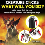 A demonic dog with horns on a fiery background. Text reads: Creature Cocks: What will you do? Add flair to your water flask, wallet, and dungeon keys. Three insets show the Creature Cocks Hell-Hound Keychain on a water flask, keys, and wallet. Ideal for fantasy roleplay!.