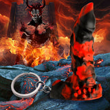 Amidst fiery lava streams in a fantasy landscape, a horned figure looms while the Creature Cocks Fire Demon Keychain, resembling a stylized horn with alluring texture, lies in the foreground.