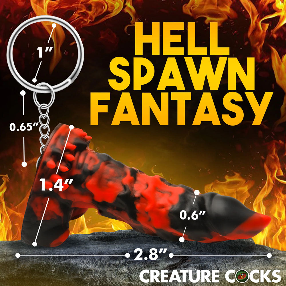 The Creature Cocks Fire Demon Keychain is a novelty fantasy dildo keyring in black and red, featuring a 1 top, 1.4 width, 0.6 narrow end, 2.8 length, and 0.65 base. It features HELL SPAWN FANTASY, ideal for roleplay enthusiasts.