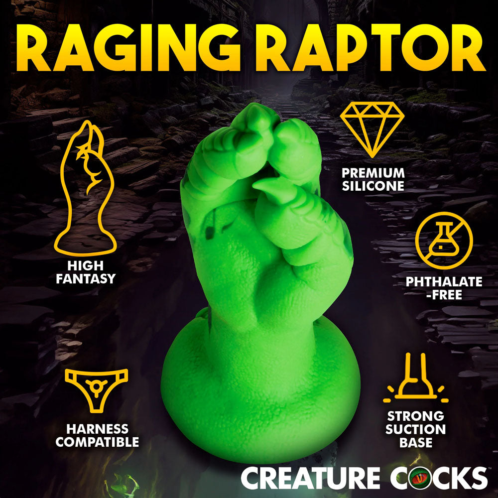 From the shadows of a dimly lit cave, the Creature Cocks Raptor Claw emerges—a green, dinosaur claw-shaped fantasy dildo made of premium silicone with a robust suction base. Its phthalate-free, harness compatible, and perfect for roleplay scenarios.