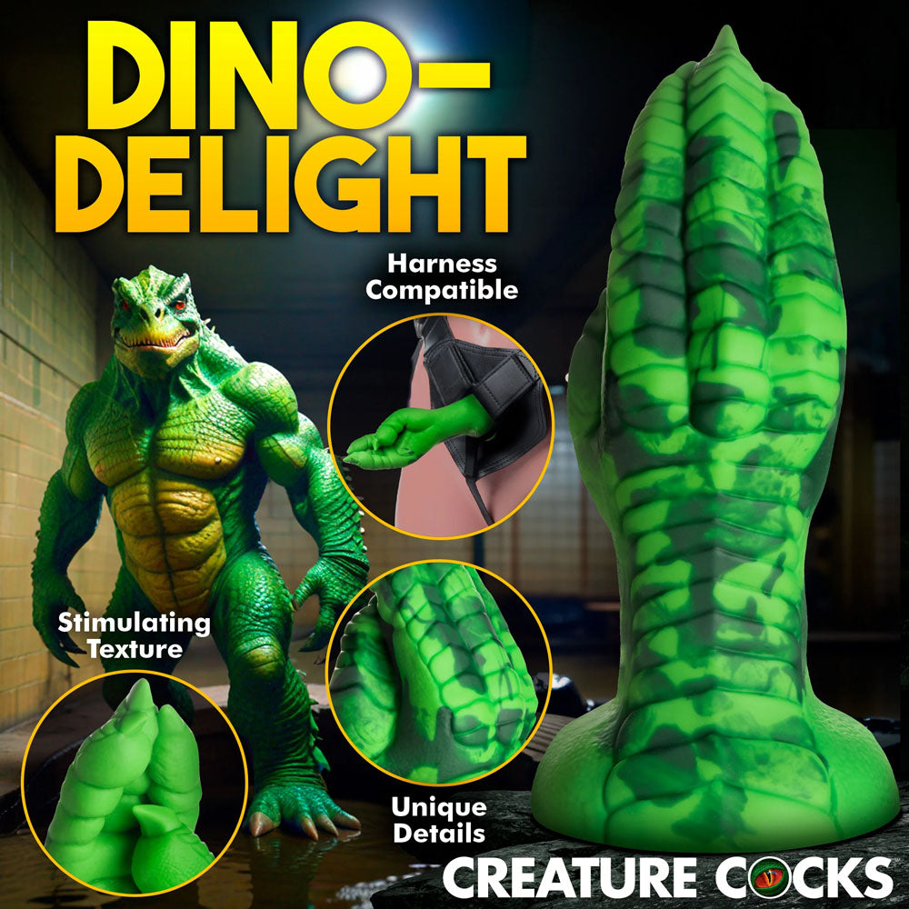 A promotional image features the Dino-Delight green, reptilian Creature Cocks Raptor Claw Fisting Silicone Dildo (21.8 cm) with Stimulating Texture, Harness Compatible, and Unique Details for fantasy roleplay.