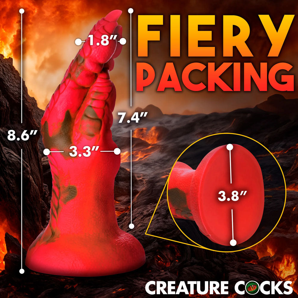 The Creature Cocks Demon Claw Fantasy Dildo, standing at 8.6 inches with a 3.3 to 4.4-inch circumference and a base diameter of 3.8 inches, is perfect for fantasy roleplay with its dragon scale and horn design against a fiery lava backdrop.