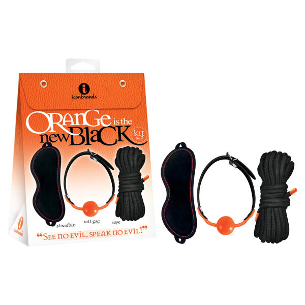 The Orange Is The New Black Kit #2 - See No Evil, Speak No Evil! - Bondage Kit is perfect for BDSM enthusiasts, featuring a black blindfold with orange trim, a black ball gag with an orange ball, and black rope for restraint. The packaging highlights sensory deprivation with the brand icon.
