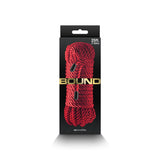 A 7.6-meter Bound Rope in red polyester, neatly coiled and secured by black bands, is branded nsnovelties on a sleek black and gray box background displaying the length in both feet and meters.