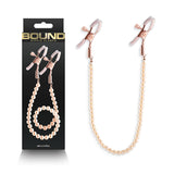 Buy Bound Nipple Clamps - DC1 - Rose Gold - Rose Gold Nipple Clamps with Gold Pearl Chain at NZ’s Mega Adult Toys Store. Discover premium sex toys with discreet shipping at the best price in NZ