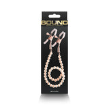 Buy Bound Nipple Clamps - DC1 - Rose Gold - Rose Gold Nipple Clamps with Gold Pearl Chain at NZ’s Mega Adult Toys Store. Discover premium sex toys with discreet shipping at the best price in NZ
