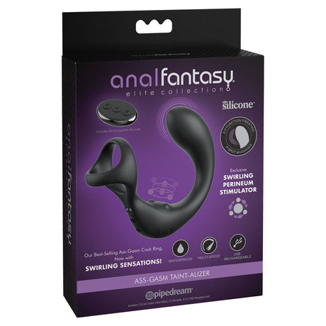 The image shows the packaging for the Anal Fantasy Elite Ass-Gasm Taint-alizer, a black USB rechargeable prostate massager with cock ring. Featuring a sleek design with swirling elements, this waterproof product and remote are showcased in a box with purple accents emphasizing perineum stimulation benefits.