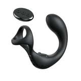 The Anal Fantasy Elite Ass-Gasm Taint-alizer, a black prostate massager with handle and three-button remote, offers smooth perineum stimulation with its curved tip. The remote has buttons labeled M, G, and a power symbol. It features a sleek design, rounded base, and USB rechargeability.