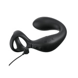 The Anal Fantasy Elite Ass-Gasm Taint-alizer, a black curved wearable device, is set against a white backdrop. It showcases a looped handle and smooth contours for perineum stimulation, with visible buttons for power and settings on the side. A cord connects to its charging port for USB recharging.