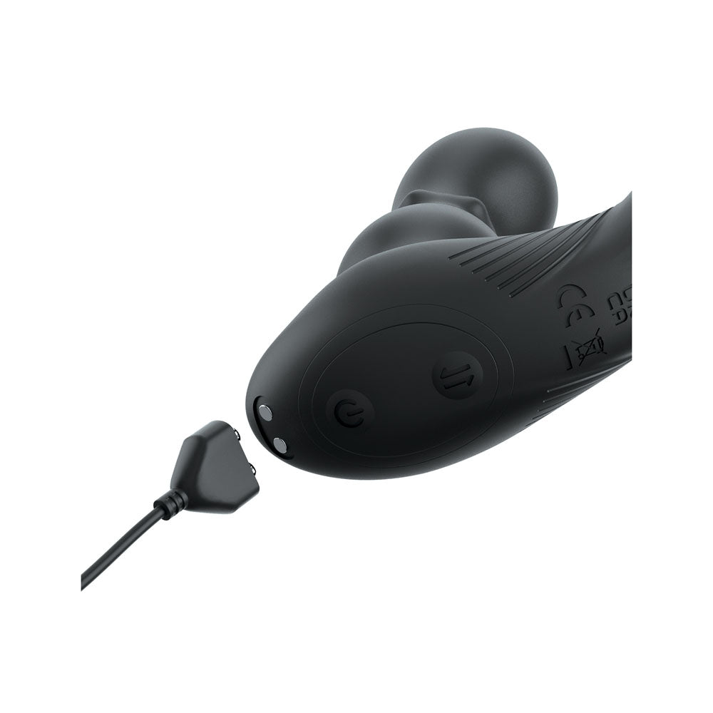 Close-up of the Anal Fantasy Elite Ass-Gasm Slide & Glide in sleek black, designed for optimal P-Spot stimulation. It features two buttons, a textured grip with indented circular patterns, and a triangular magnetic charger. Symbols and grooves hint at its Ass-Gasm functionality.