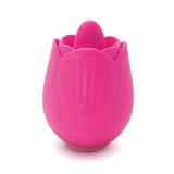 The Skins Rose Buddies - The Rose Flix is a pink, rose-shaped flicking stimulator made from body-safe silicone. It features petal-like edges, an embossed lips design, and a central power button, ideal for clitoral play. USB rechargeable, it resembles a flower in full bloom.
