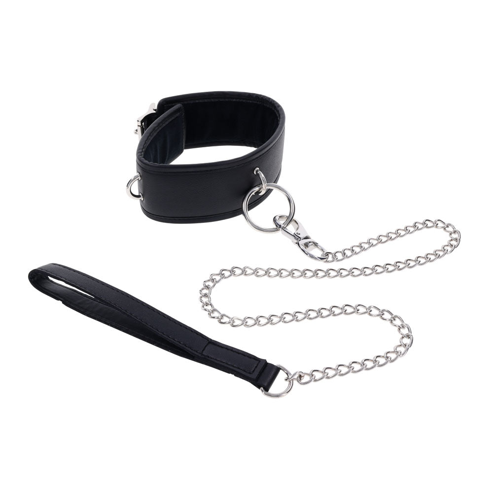 The EDGE Collar & Leash features a black faux leather collar with silver metal ring hardware and an adjustable buckle, connecting to a detachable silver chain leash with a black handle loop, elegantly displayed against a white background.