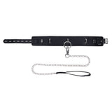 The EDGE Collar & Leash - Black Neck Restraint features a black faux leather collar with studs and a metal buckle, attached to a heavy-duty metal chain leash. This design includes extra loops and rings for versatile attachment, and it ends with a leather handle.
