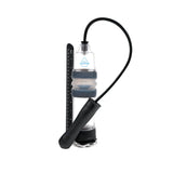Introducing the Zolo Aquapump Auto Pro: a clear, ribbed water penis pump with a black flexible hose and handle. It features an attached ruler for precision and a waterproof design highlighted by a triangular logo. Perfect for personal or fitness use, it blends functionality with sleek style.
