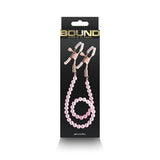 Buy Bound Nipple Clamps - DC1 - Pink - Gold Nipple Clamps with Pink Pearl Chain at NZ’s Mega Adult Toys Store. Discover premium sex toys with discreet shipping at the best price in NZ
