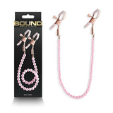 Buy Bound Nipple Clamps - DC1 - Pink - Gold Nipple Clamps with Pink Pearl Chain at NZ’s Mega Adult Toys Store. Discover premium sex toys with discreet shipping at the best price in NZ