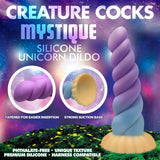 Experience the magic of Creature Cocks Mystique, a colorful 21 cm silicone unicorn dildo. This pastel purple fantasy features a twisted design with a tapered tip and strong suction cup base. Made from premium, phthalate-free silicone, its harness compatible for adventurous journeys.