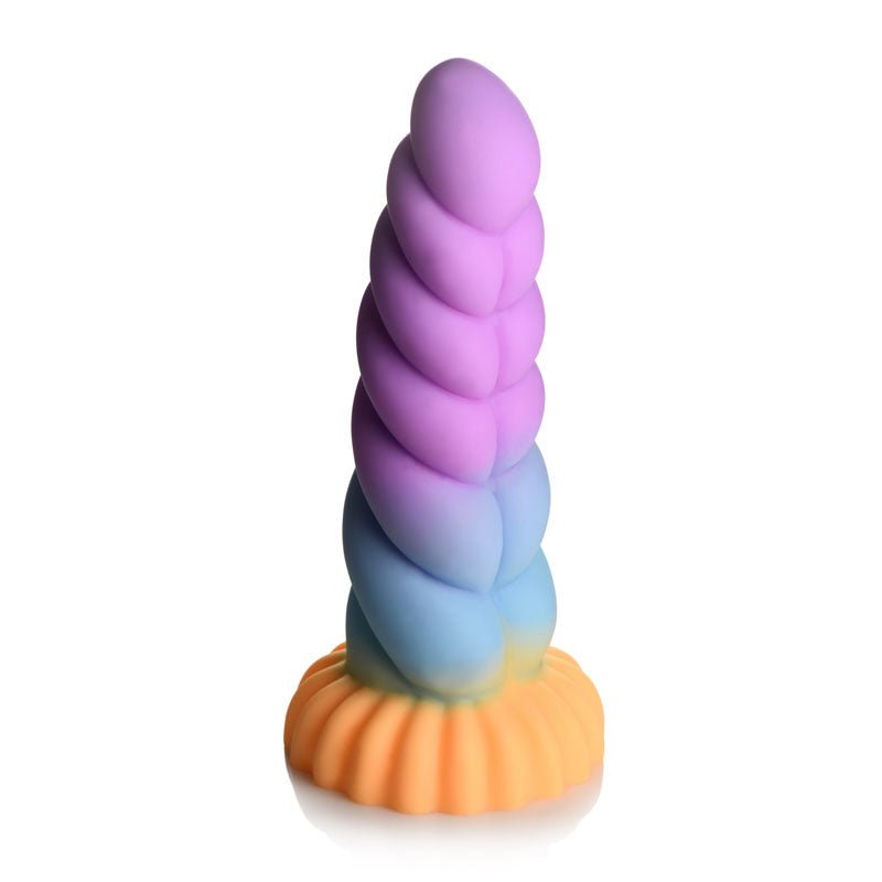 The Creature Cocks Mystique Silicone Unicorn Dildo is a colorful, spiraled toy with a unicorn-horn shape and a sturdy yellow-orange base. Crafted from premium silicone, it features a gradient from purple at the top through blue to green at the base, standing upright against a white background.