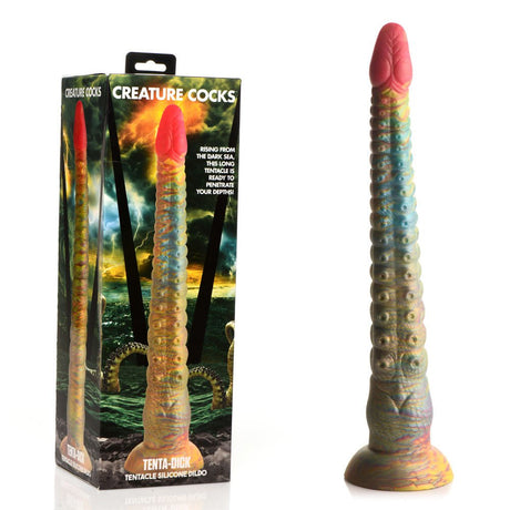 The Creature Cocks Tenta-Dick, a 32 cm multi-colored tentacle fantasy dildo made of phthalate-free silicone, features a vibrant, textured design. It stands upright beside packaging adorned with a sea monster graphic and the bold Creature Cocks label.